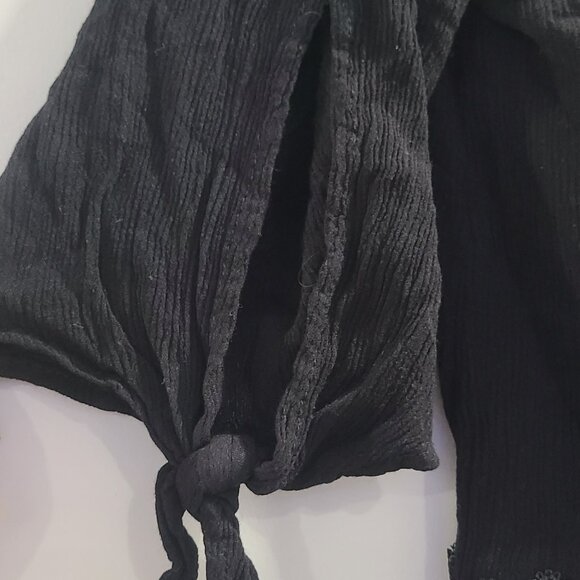 Black crop blouse with lace bottom detail and peekaboo sleeve. Like new - Picture 4 of 5